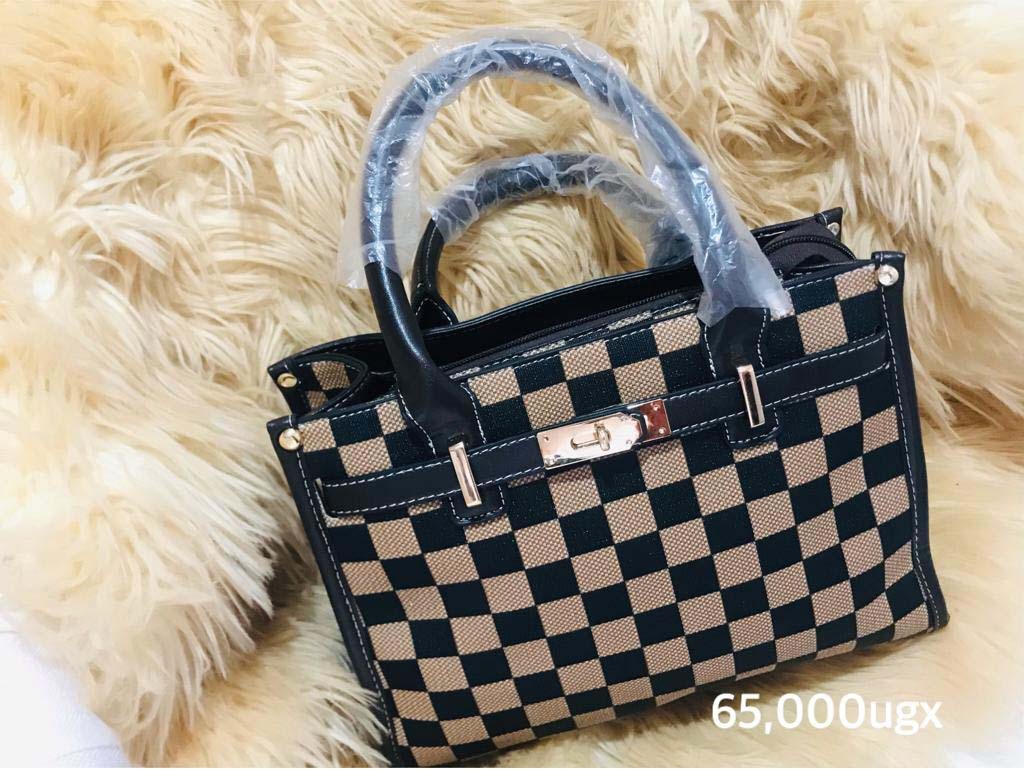 Handbags for Sale in Kampala Uganda. Designer Stylish and Trendy Ladies' Handbags | Women's Bags | Birthday Gift Bags | Order Now for Delivery in Kampala. Calls: +256 781 712 913, Whatsapp: +256 756 758 081. Prettybags, We sell/supply and deliver fashionable womens' bags/ladies' handbags for all events and occasions/women party bags, office bags when you order with us online/call. We are located in Naalya Estate next to Naalya Estate Supermarket 'aka' Lucky7 Supermarket Wakiso Uganda, Ugabox