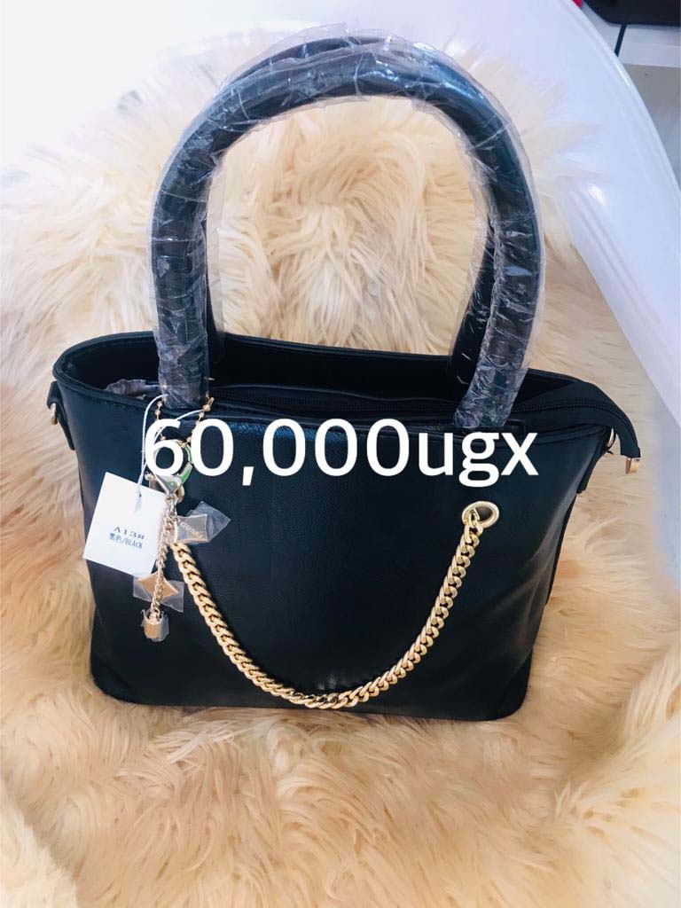 Handbags for Sale in Kampala Uganda. Designer Stylish and Trendy Ladies' Handbags | Women's Bags | Birthday Gift Bags | Order Now for Delivery in Kampala. Calls: +256 781 712 913, Whatsapp: +256 756 758 081. Prettybags, We sell/supply and deliver fashionable womens' bags/ladies' handbags for all events and occasions/women party bags, office bags when you order with us online/call. We are located in Naalya Estate next to Naalya Estate Supermarket 'aka' Lucky7 Supermarket Wakiso Uganda, Ugabox