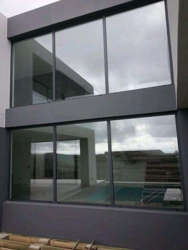 Aluminium Profile Sliding and Fixed Windows in Kampala Uganda, Aluminium Design Works/Installation and Glass Works in Uganda, Luxury Aluminium and Glass Solutions Uganda, Ugabox