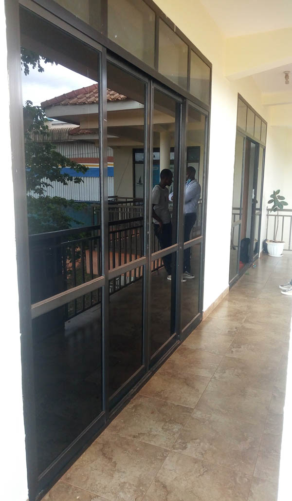 Aluminium Profile Sliding Doors in Kampala Uganda, Aluminium Design Works/Installation and Glass Works in Uganda, Luxury Aluminium and Glass Solutions Uganda, Ugabox