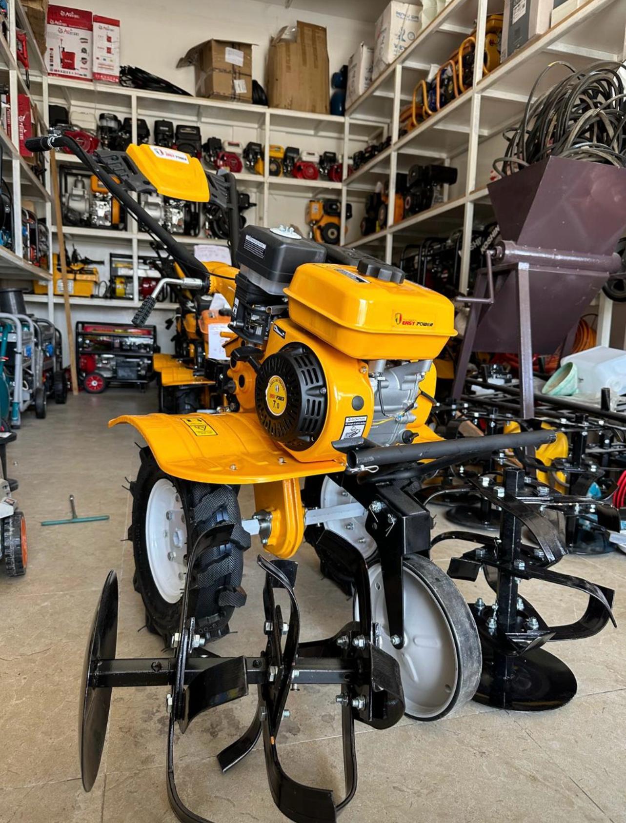 Garden Tiller Price Uganda. UGX: 3,300,000. Garden Tiller, Ploughing Machine, Easy Power Brand, 7.0 HP Engine, Petrol Engine. Garden Tiller With Ploughing Discs For Farm Work and Garden Preparation. Walking Tractor for Sale in Kampala Uganda. Agricultural Farm/Garden Equipment Uganda. Machine World Uganda For Agricultural Machinery/Agro Equipment. Importer, Supplier, Distributor, Assembler and Installer of Agro/Agricultural Equipment in Kampala-Uganda, East Africa: Kigali-Rwanda, Juba-South Sudan, DRC-Congo. Agro Machinery, Ugabox Marketing Platform Uganda | Ugabox.com